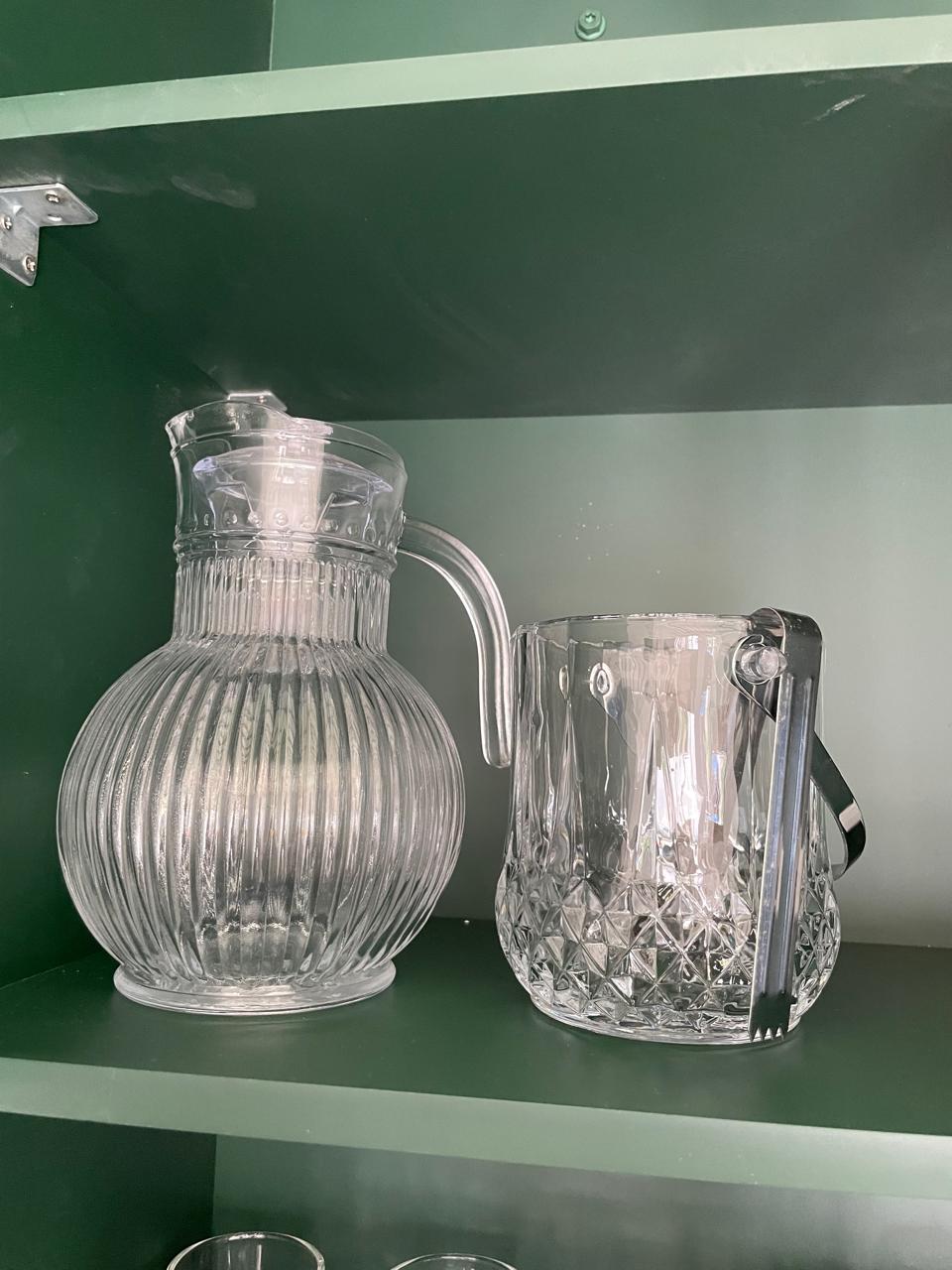 Ribbed glass water jug and a cut-glass pitcher for serving