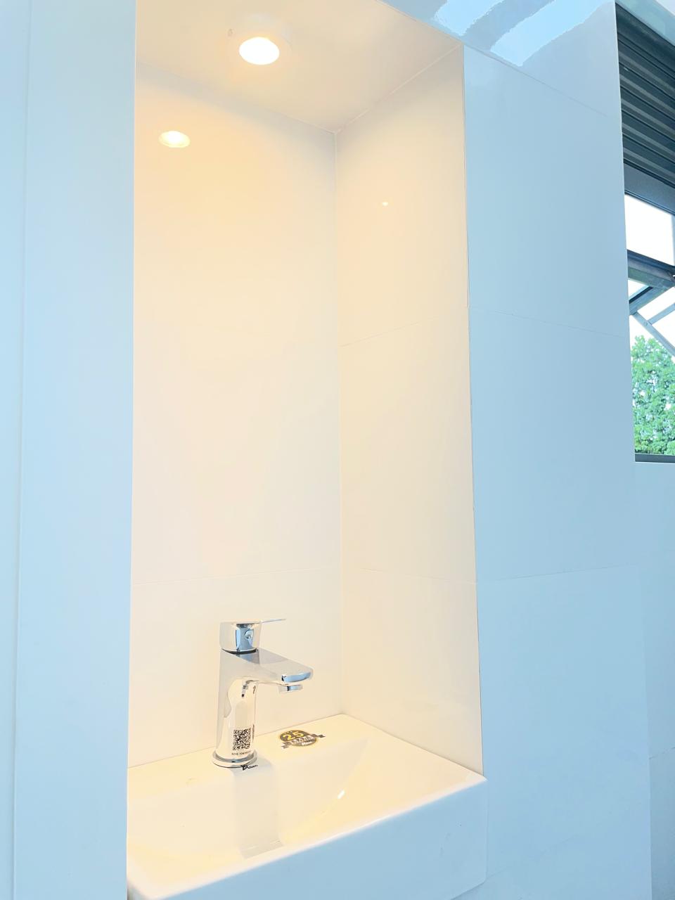 Powder room vanity with premium chrome fittings